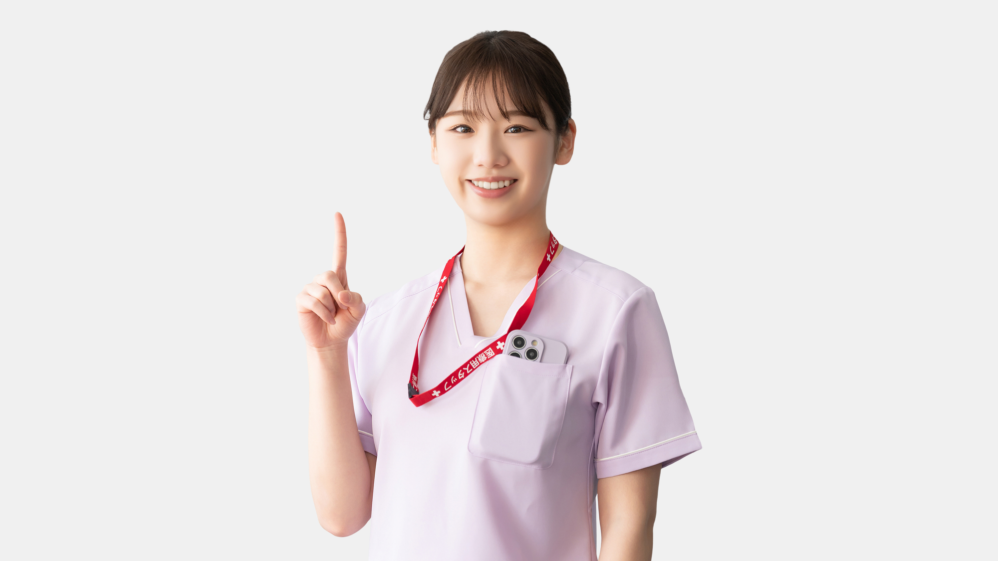 指をさす薬剤師